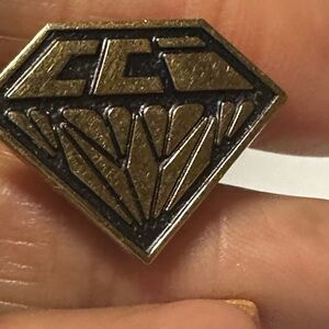 Diamond-Shaped Brass Pin with CC Logo-collectibles